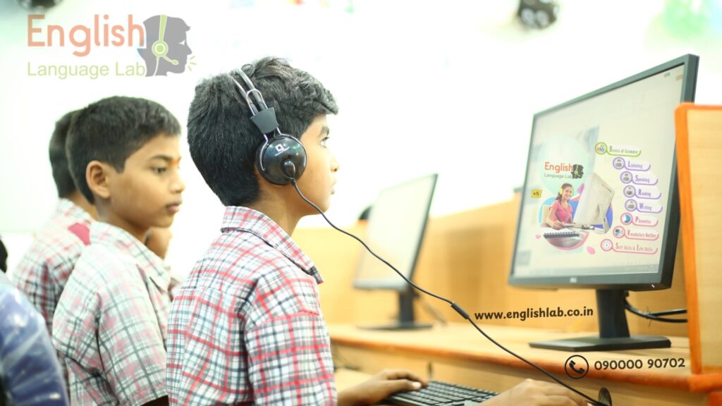 Students using computers in an English language lab software, engaged in interactive learning with headphones.