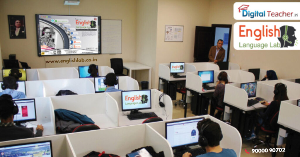 Students learning English in a school or college digital language lab classroom with individual computers and headsets. The classroom setup includes a large screen display and interactive software from Digital Teacher English Language Lab Software.